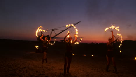 Fire-show.-A-group-of-professional-artists-performs-a-variety-of-fire-facilities.-Boys-and-girls-performed-dances-with-fire-in-the-night-on-the-street-in-the-Park